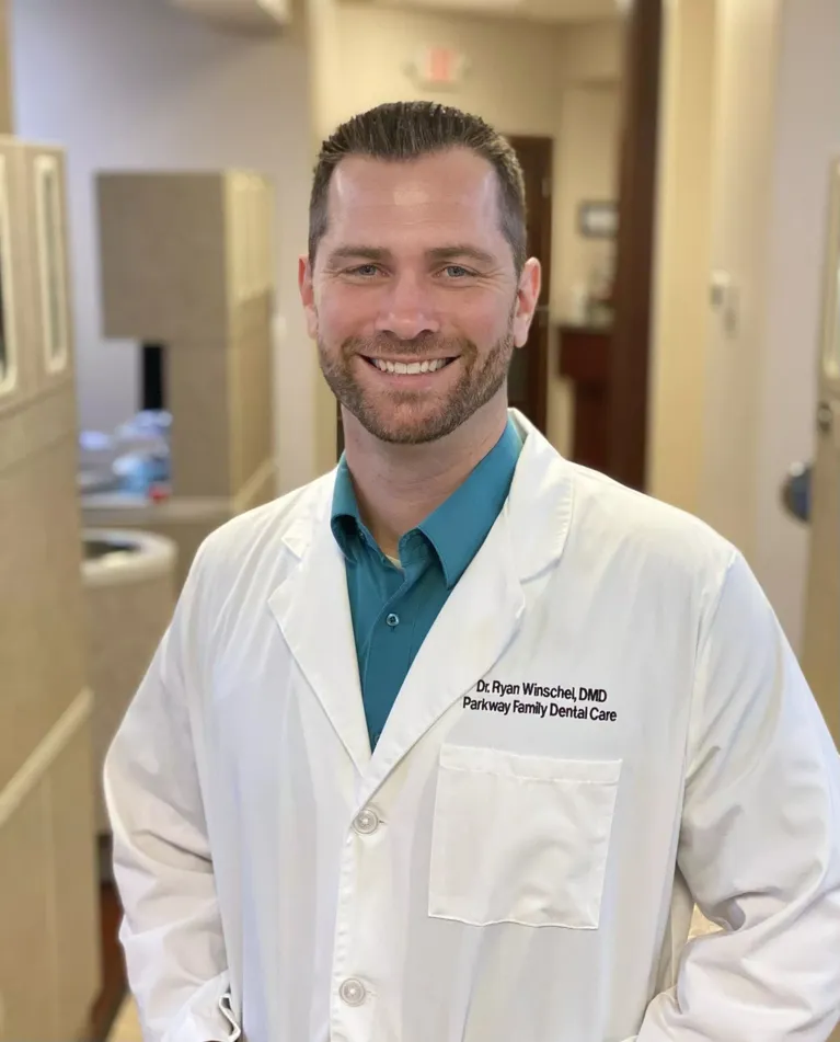 Friendly dental team member in professional attire in the Wentzville office