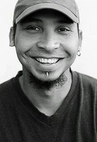 Woman holding a cigarette, representing the impact of smoking on oral health and tooth staining